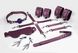 Набор Feral Feelings BDSM Kit 7 Burgundy, наручники, поножи, коннектор, маска, паддл, кляп, зажимы